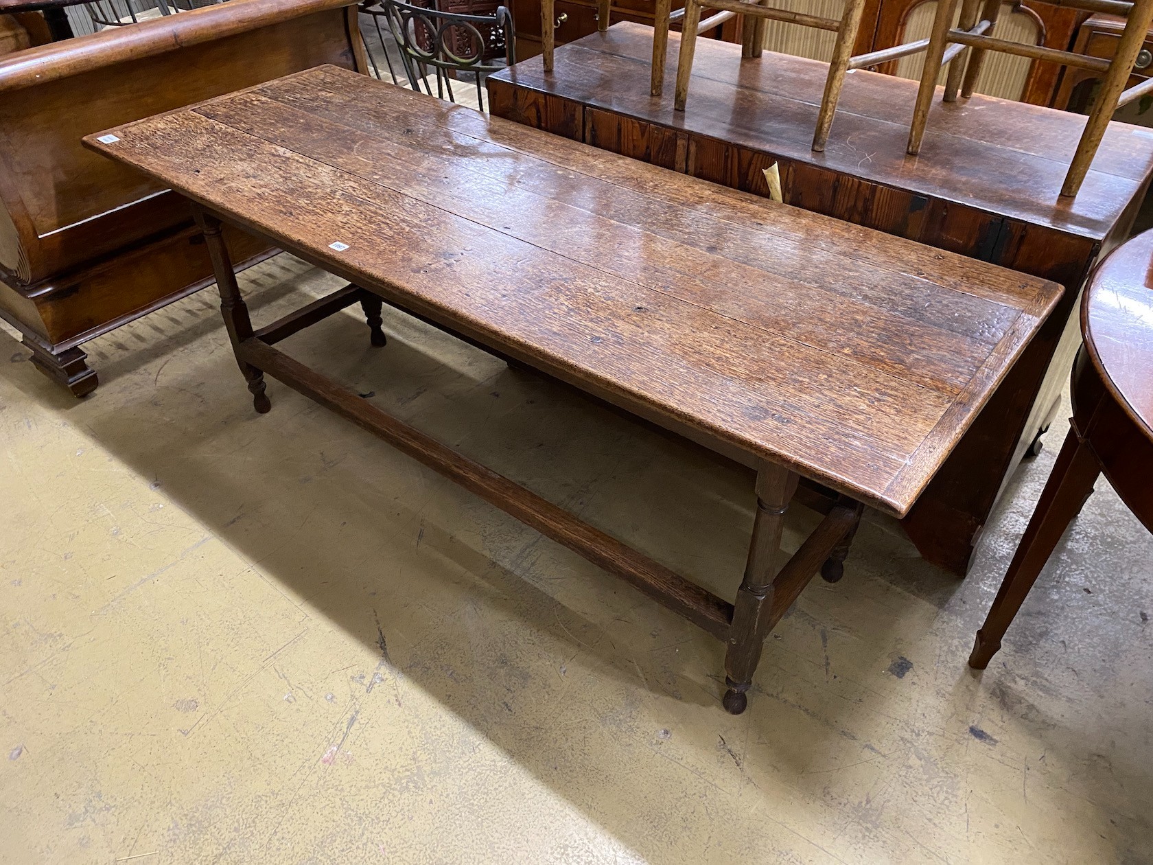 An 18th century and later oak serving table, length 188cm, depth 68cm, height 74cm